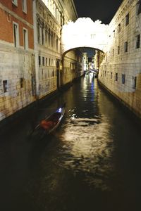 View of canal passing through buildings