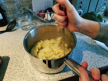 High angle view of person preparing food in kitchen