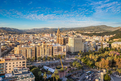 High angle view of buildings in city against sky