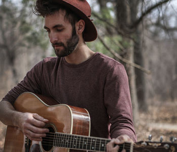 Young man playing guitar