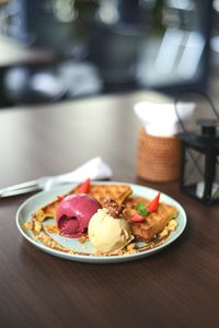 Close-up of food served on table