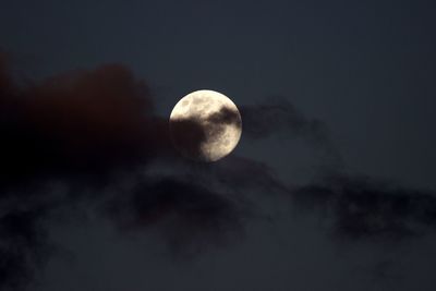 Low angle view of moon against sky