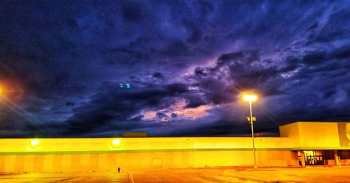 Illuminated street lights at night