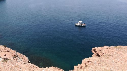 High angle view of sailboat sailing on sea