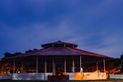 Low angle view of building against sky at dusk