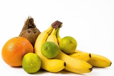 Close-up of oranges against white background