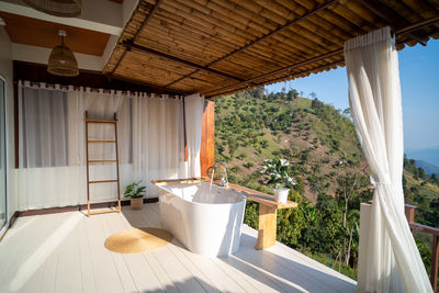 Outdoor bathtub with mountains view , doi chang, chiang rai, thailand