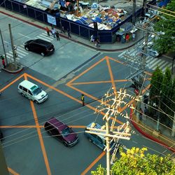 High angle view of cars on road in city