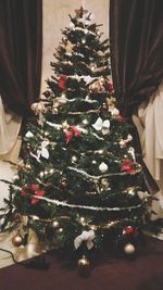 Close-up of christmas tree at home