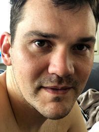 Close-up portrait of young man smiling