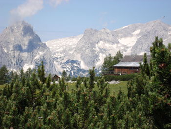 Scenic view of snowcapped mountains against sky