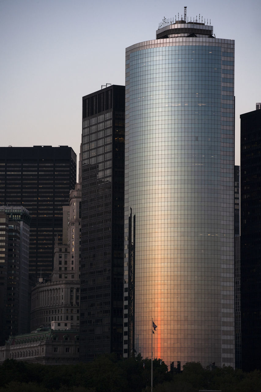 LOW ANGLE VIEW OF BUILDINGS AGAINST CLEAR SKY