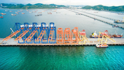 High angle view of commercial dock against sea