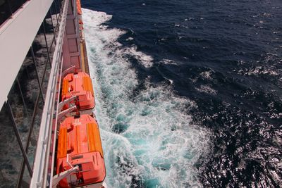 High angle view of ship sailing in sea