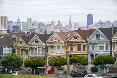 Buildings in city against sky