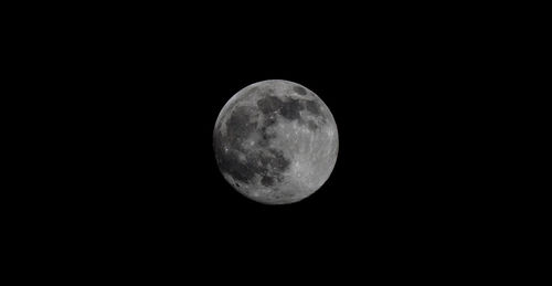 Low angle view of moon in sky