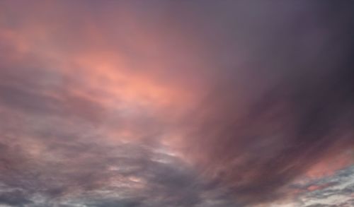 Low angle view of dramatic sky during sunset