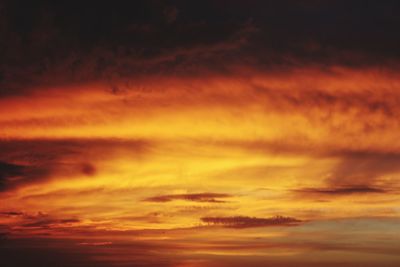 Low angle view of dramatic sky during sunset