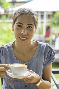 Portrait of a smiling young woman