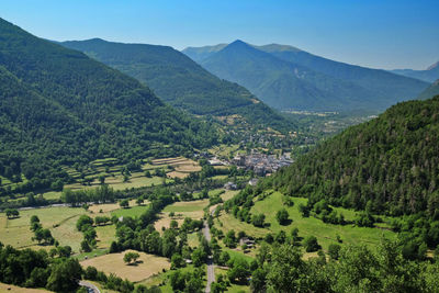 Scenic view of landscape and mountains against sky