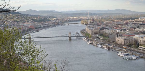 High angle view of river amidst buildings in city