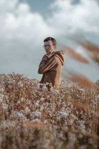  man in the field against the sky 