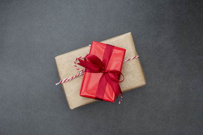 Christmas presents and decoration on gray background