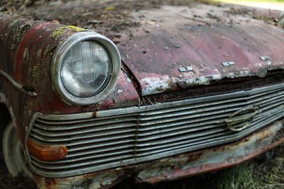 Close-up of abandoned vintage car