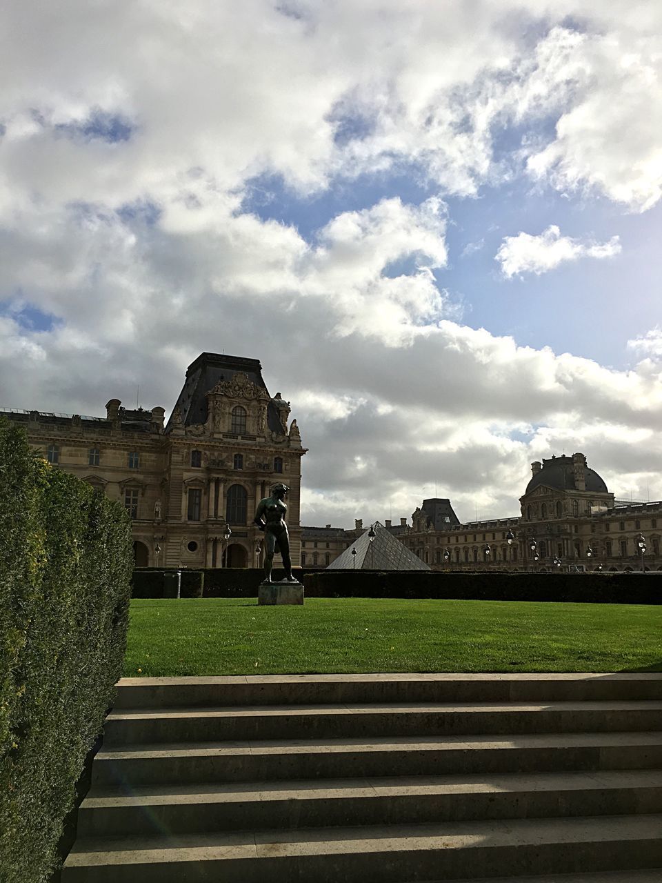 architecture, building exterior, built structure, sky, grass, cloud - sky, history, cloud, cloudy, lawn, day, tree, green color, travel destinations, the past, outdoors, field, famous place, no people, travel