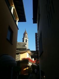 Low angle view of church against blue sky