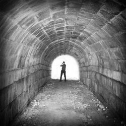 People walking in tunnel