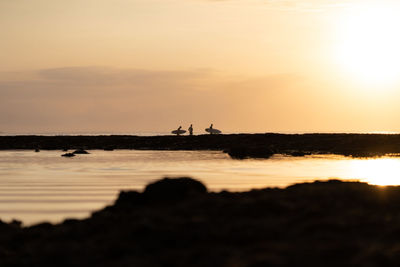 Scenic view of sea during sunset