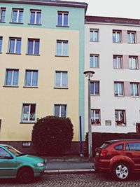 Cars parked in front of building