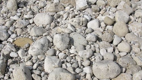 Full frame shot of pebbles on beach