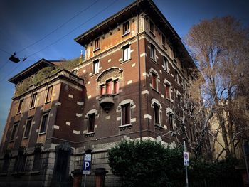 Low angle view of old building against sky