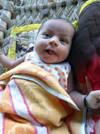 Portrait of cute baby lying down
