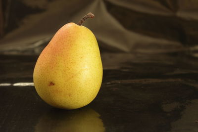 Close-up of lemon on table