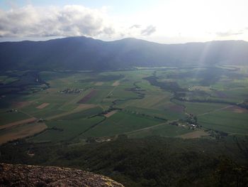 Landscape with mountain range in background