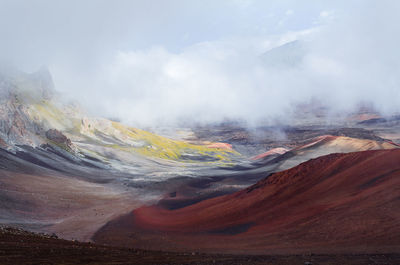 Scenic view of volcanic landscape against sky