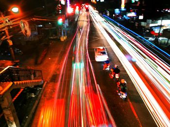 High angle view of light trails on city street