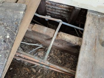 High angle view of ladder in abandoned building