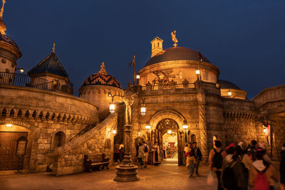 Group of people in front of building