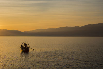 Boats sailing in sea