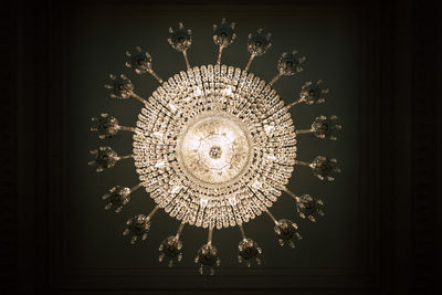 Low angle view of illuminated chandelier