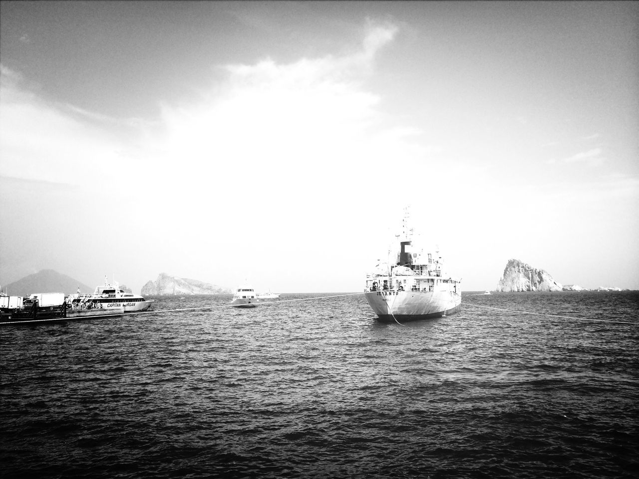 nautical vessel, transportation, sea, water, mode of transport, boat, waterfront, sky, sailing, sailboat, rippled, ship, tranquil scene, tranquility, horizon over water, nature, day, cloud - sky, moored, scenics