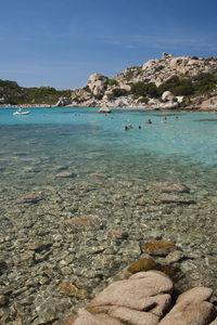 Scenic view of beach against blue sky