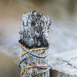 Close-up of chain tied up on snow