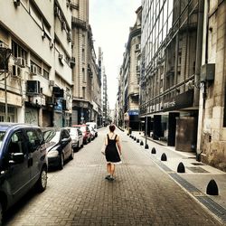 Woman walking on city street