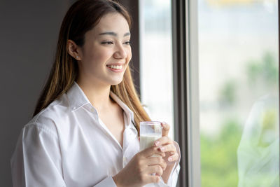 Young woman using mobile phone