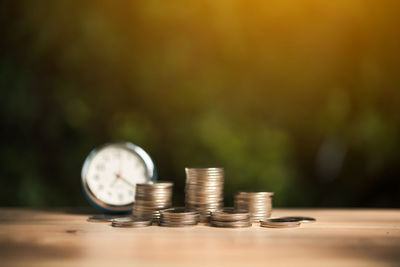 Close-up of coins on table